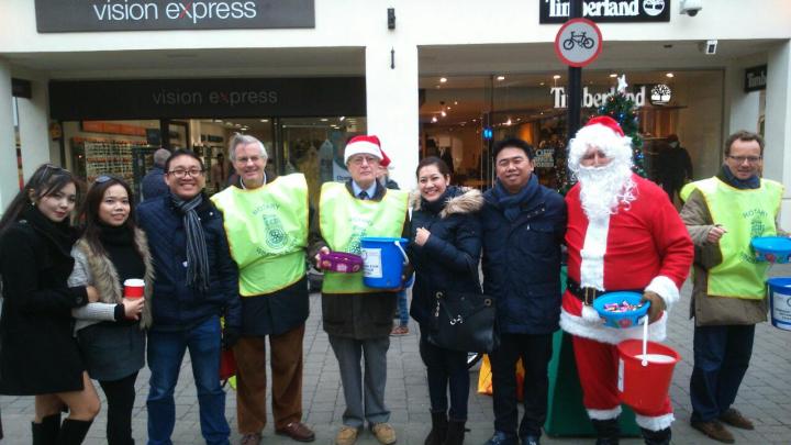 Santa gets some help from Rotarians and people from Thailand